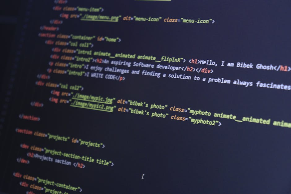 Close-up of a computer screen displaying colorful lines of code with syntax highlighting, including functions, variables, and tags. The code is layered and blurred with a focus on the vibrant colors a